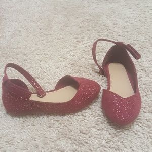 Maroon and gold shoes